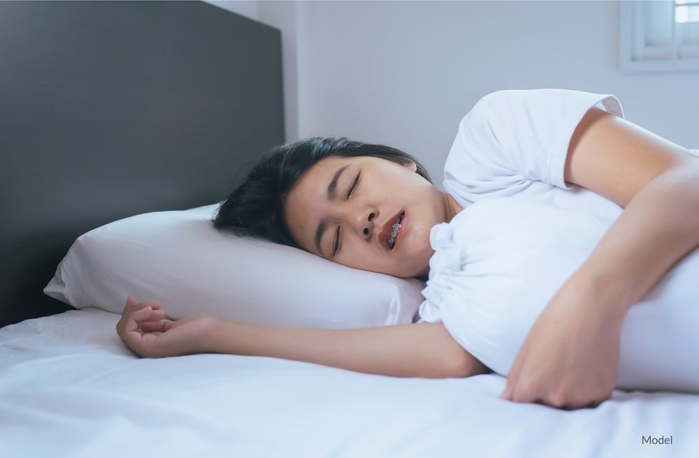 woman grinding teeth in her sleep